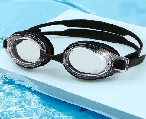 Black swimming goggles with prescription lenses and a matching case, alongside plain blue swimming goggles.