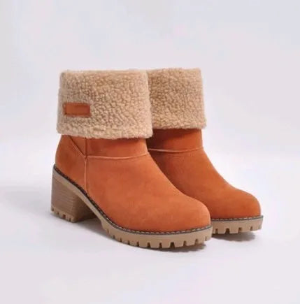 Women's thick suede mid-calf snow boots with a round toe, flat low heel, and waterproof platform sole.