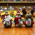 Red, green and white flannel Christmas snowman decorations measuring 18x13cm