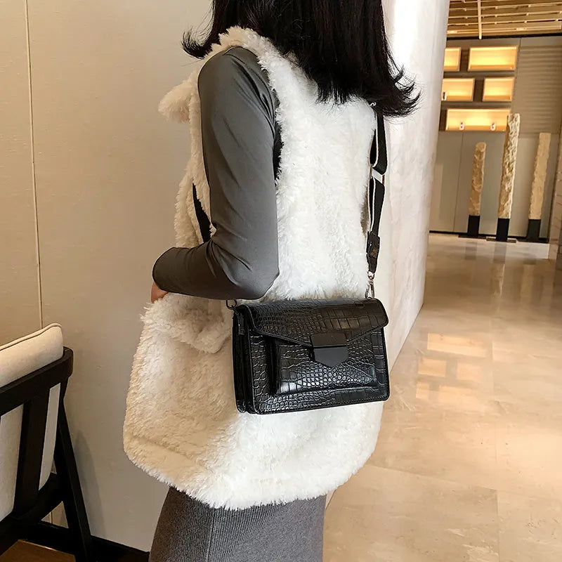 Vintage-style black PU leather crossbody bag with dimensions 20cm by 14cm by 7cm.