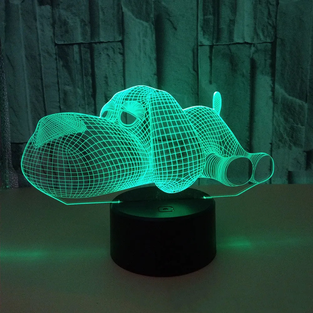 Dog-shaped desktop lamp glowing in blue with touch button and USB power cable
