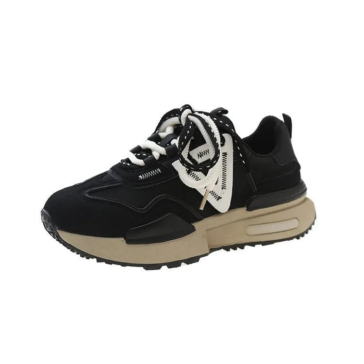 Women's black retro platform sports shoes with round toe and lace-up front on a rubber sole.