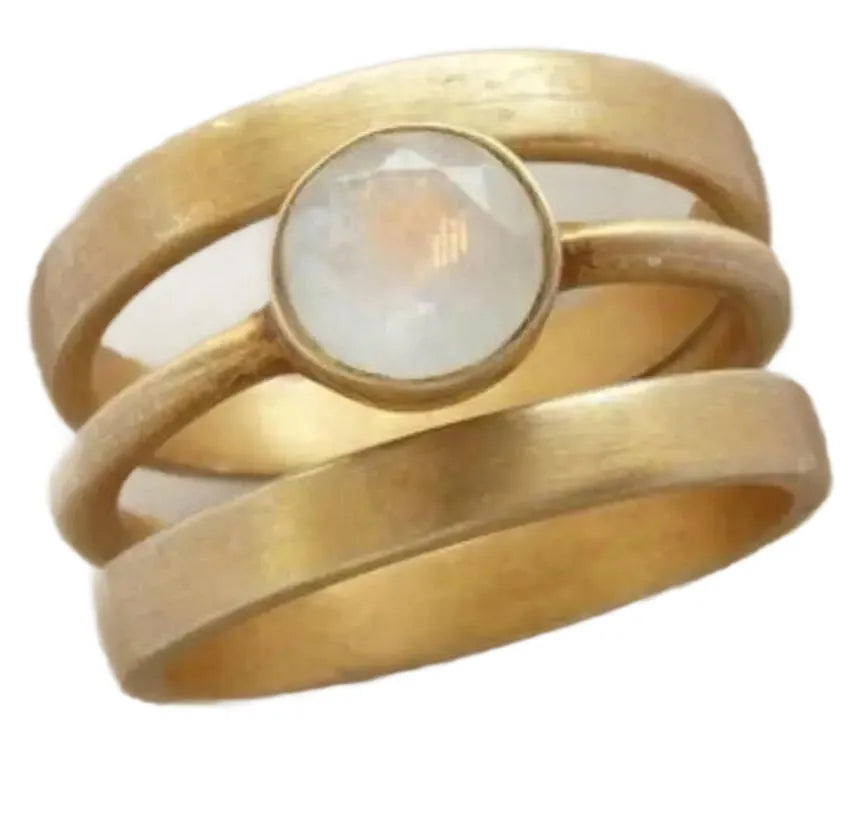 Geometric hollow gold-plated ring with micro-inlaid white chalcedony stones on a titanium steel band.