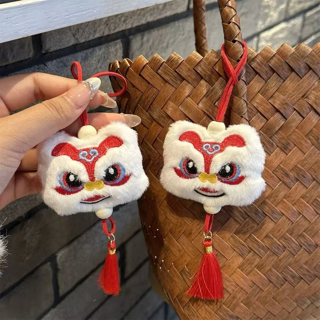 Blue and yellow Chinese style plush lion keychain ornament with star stone decorative elements