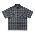Men's black plaid shirt with embroidered letter design on chest, short sleeves, and lapel collar