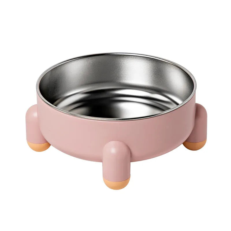 Green stainless steel pet bowl with non-slip base and high foot on a kitchen floor