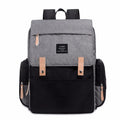 LAND Mommy large grey Oxford cloth diaper backpack with changing mat, showing front compartments.