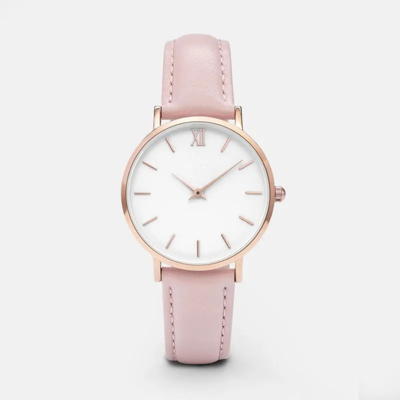 Square-faced quartz watch with an alloy case and PU leather strap on a wrist.