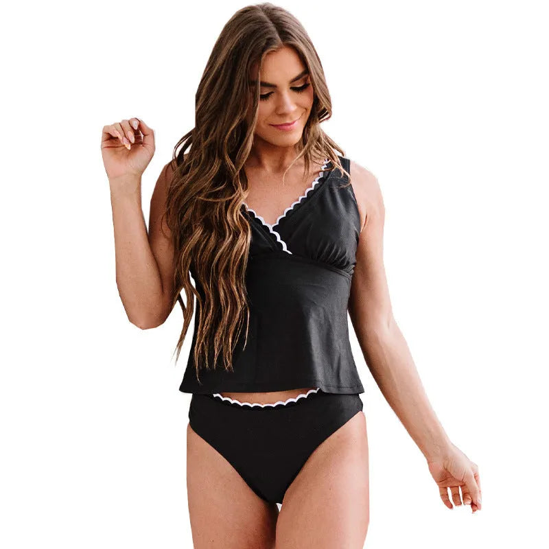 Black solid colour women's two-piece bikini swimsuit on a white background.