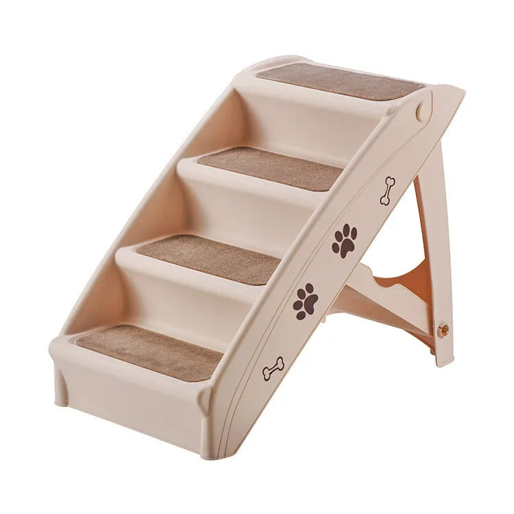 Foldable plastic pet stairs for small dogs on a carpet next to a sofa.