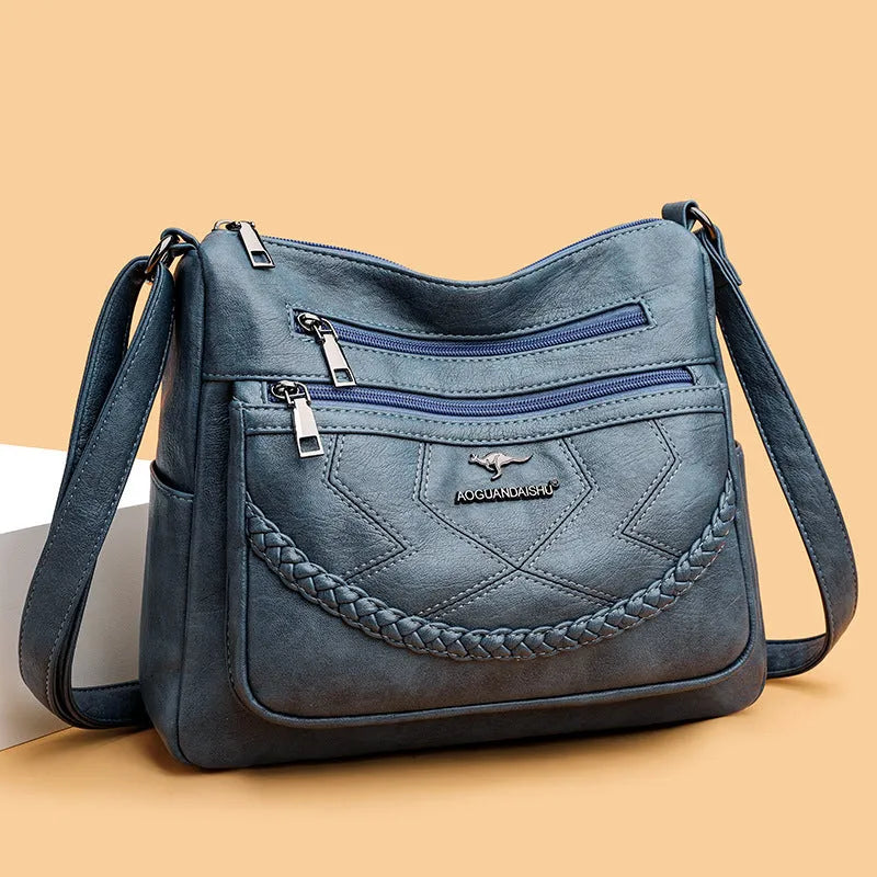 Soft PU leather women's shoulder bag in horizontal square design with crossbody strap