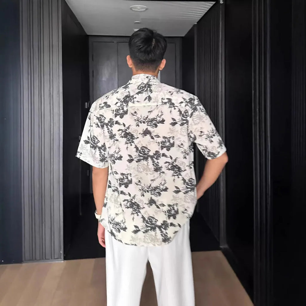 Casual printed shirt with floral pattern and loose fit in black and white colour options