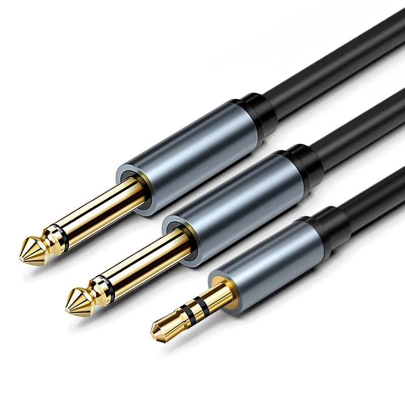 Black 3.5mm to 6.35mm stereo audio cable with gold-plated connectors on a white background