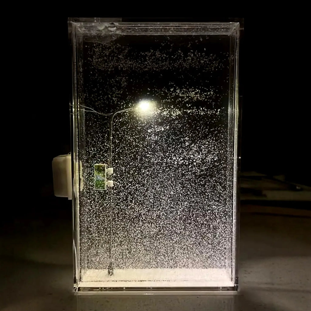 Handmade DIY snowy night light kit featuring an LED street lamp and Christmas desktop decor materials