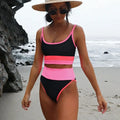 Women's solid colour quick-drying swimwear set consisting of a top and shorts.