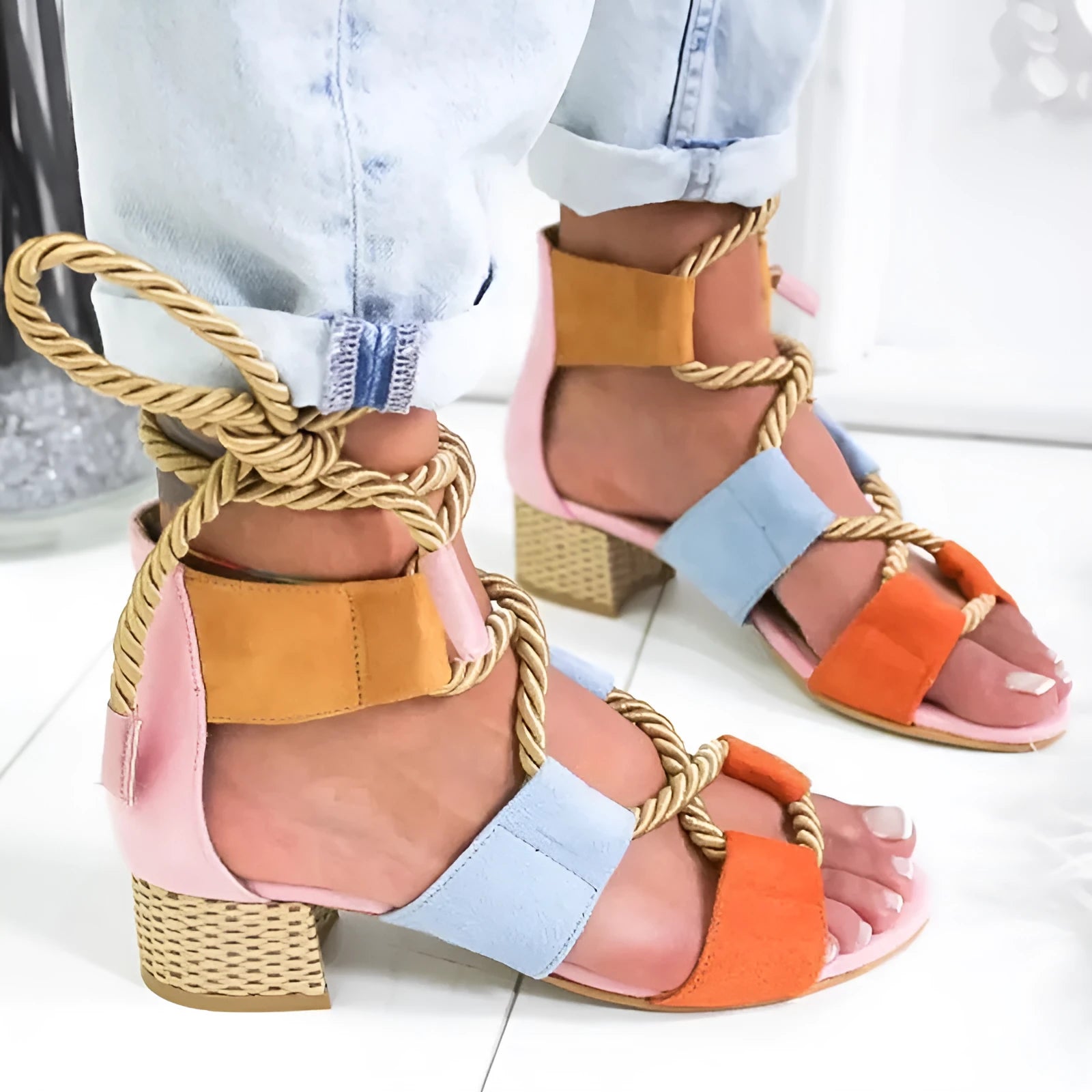 Women's beige suede sandals with front strap, fish mouth toe, and a colour-matching middle heel