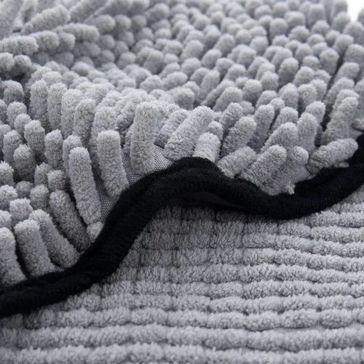 Blue thickened dog bath robe towel laid flat, showing its 62 cm length and absorbent fibre texture.