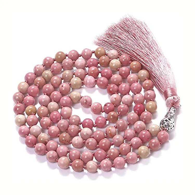 Long multicoloured agate and gemstone tassel necklace with geometric beads.