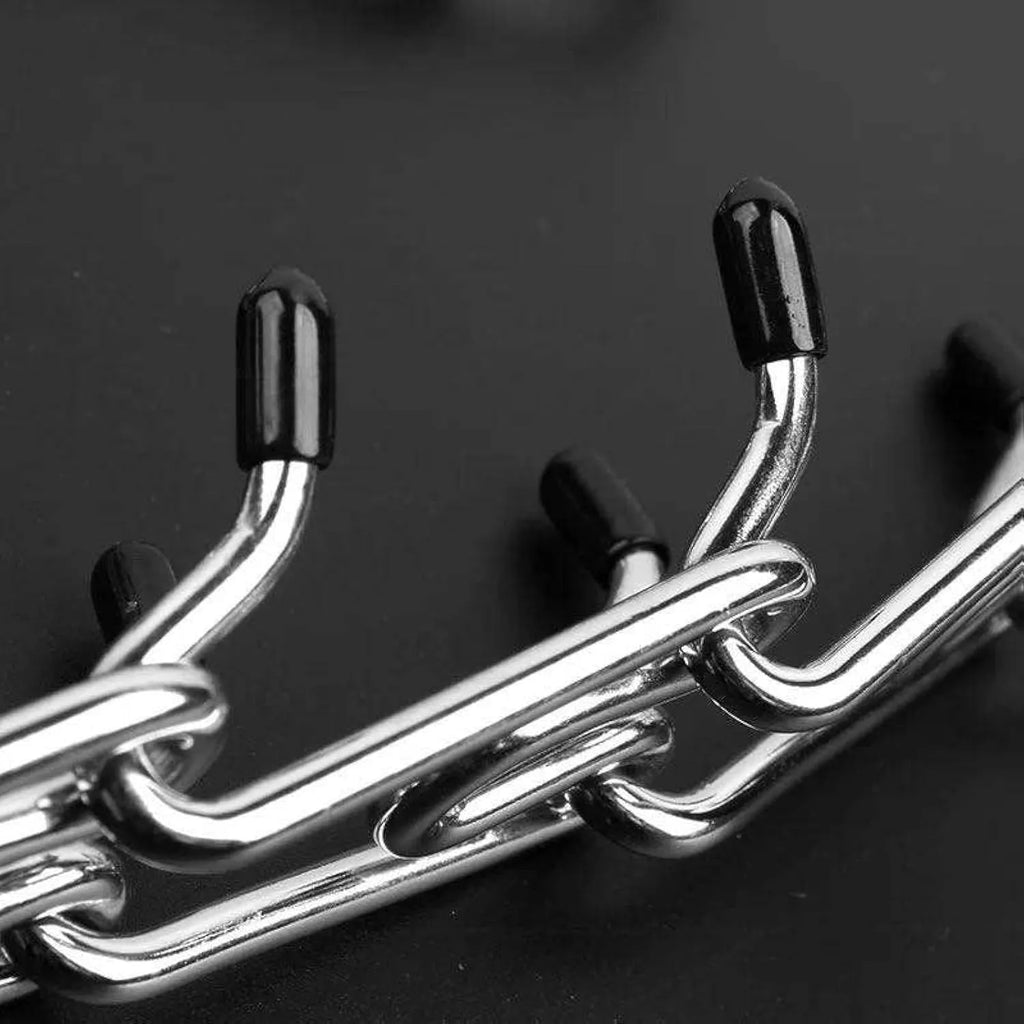 Stainless steel dog prong training collar with round links, rubber tips, shown in adjustable sizes for medium and small dogs.