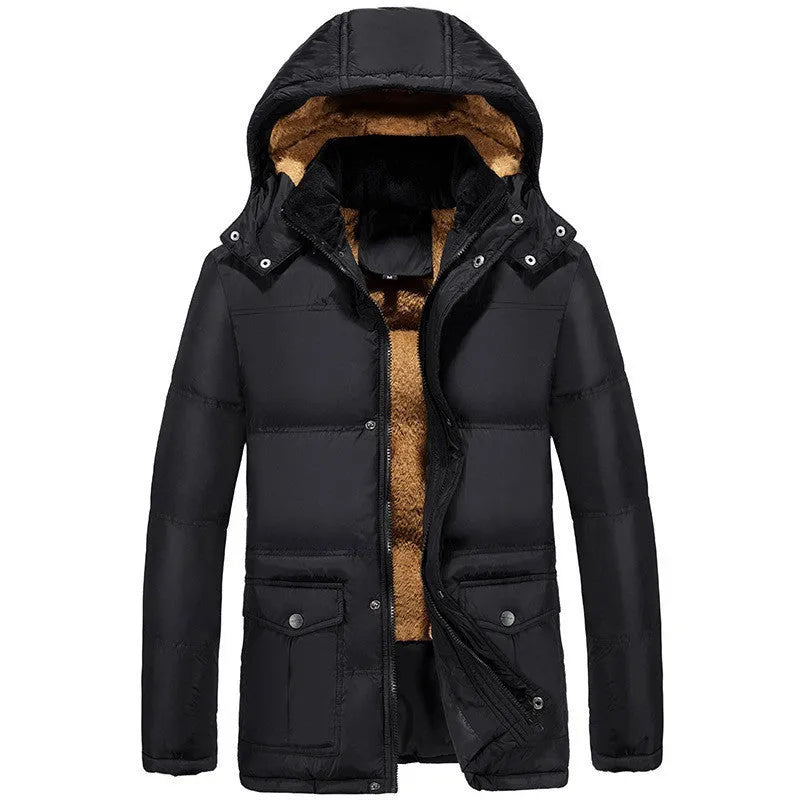 Man wearing a black loose-fit double-breasted velvet padded jacket with a hood