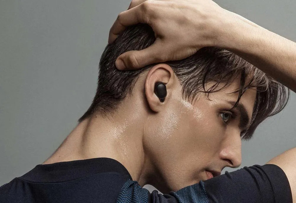Redmi AirDots 2 black true wireless Bluetooth earbuds and charging case.