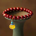 Gold cinnabar wave bracelet with manual processing and national style elements