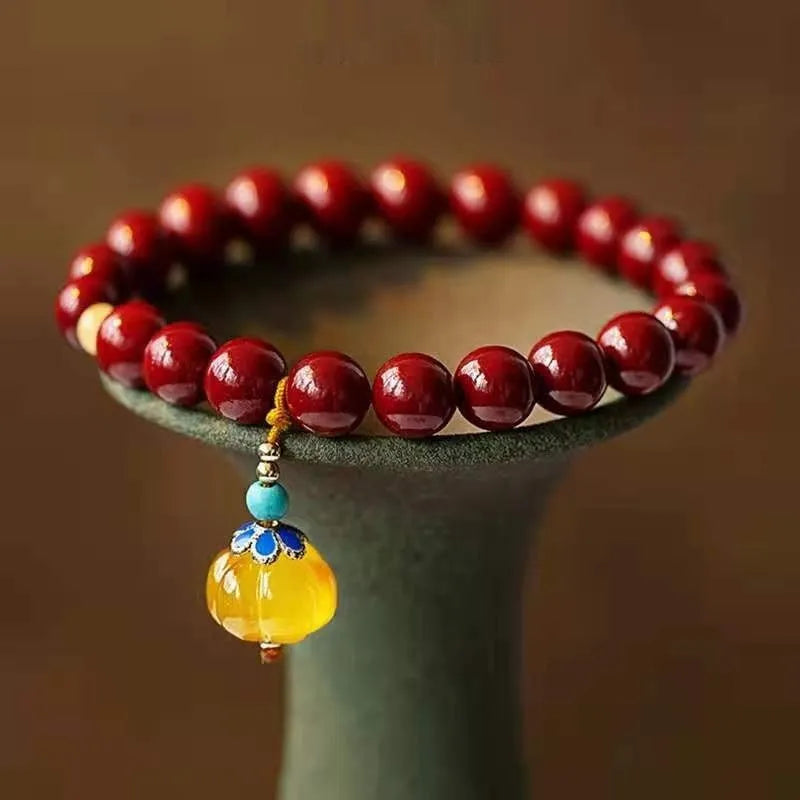 Gold cinnabar wave bracelet with manual processing and national style elements