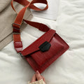 Vintage-style black PU leather crossbody bag with dimensions 20cm by 14cm by 7cm.