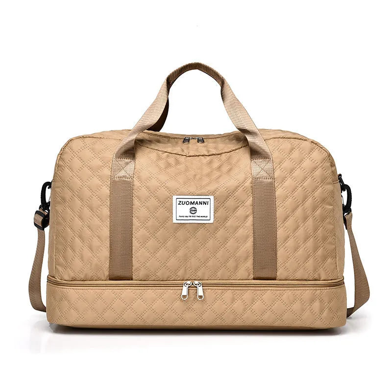 Oxford cloth travel bag with 36-55 litre capacity for leisure trips and buggy use in solid colour options