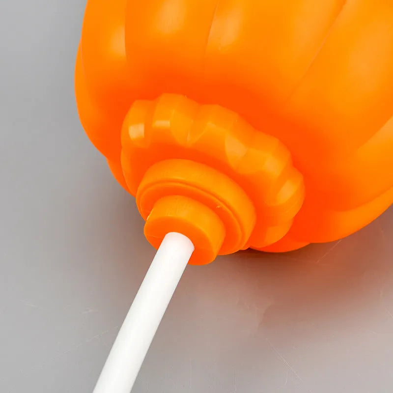 Plastic pumpkin decorative lamp with USB charging cable and yellow or purple light options