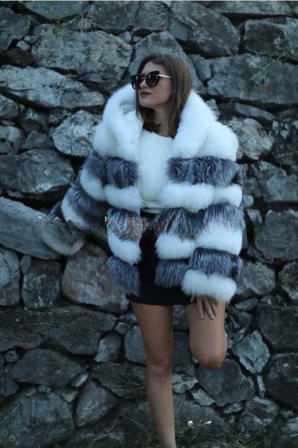 Women's loose hooded faux fur coat in street fashion style showing brown colour option