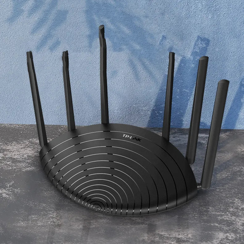TL-WDR7661 AC1900 Gigabit wireless router with compact black design on a desk