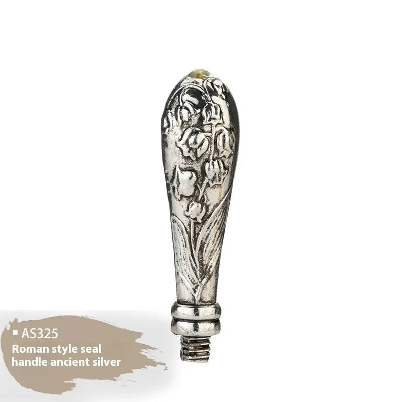 Wooden wax seal handle in a selection of different colour and decorative finishes.