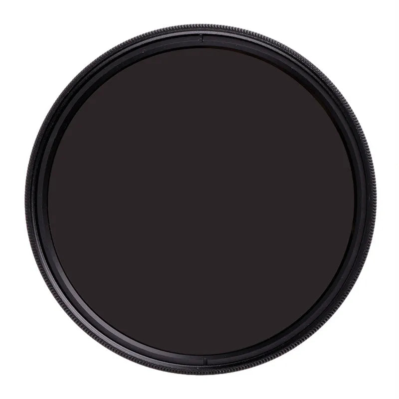 ND8 neutral density camera filter reducer with aviation aluminium frame shown next to lens.