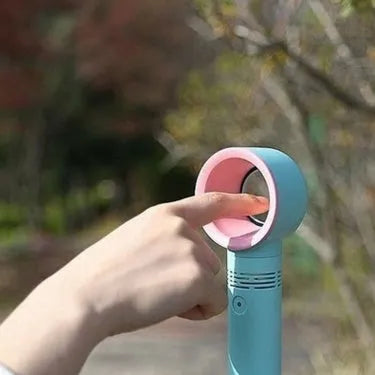 A portable bladeless desk fan with a modern design, shown on its base with a USB cable, available in multiple colours.