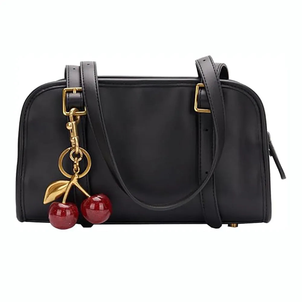 Red zinc alloy three-dimensional cherry pendant charm for key rings and bags.