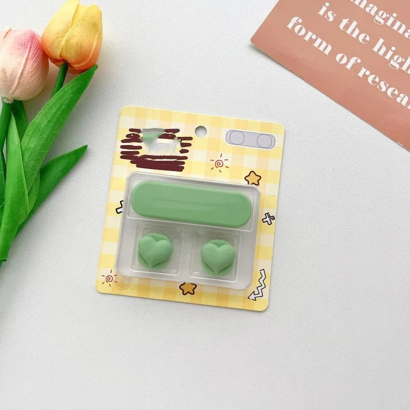 Cartoon-style plastic magnetic data cable fixer for desktop organisation.