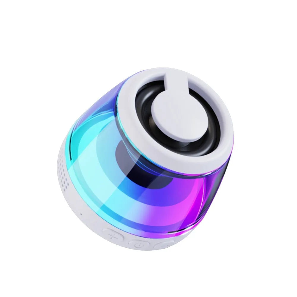 Small black or white portable Bluetooth speaker with a magnetic base and built-in lighting.