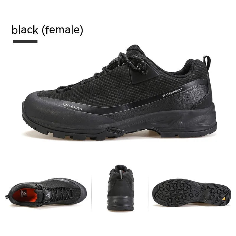 Men's low-top hiking boots in black with a leather mesh upper and rugged rubber outsole.