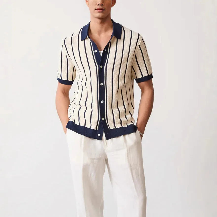 Men's white asymmetric lapel knitted top with short sleeves and a striped pattern.