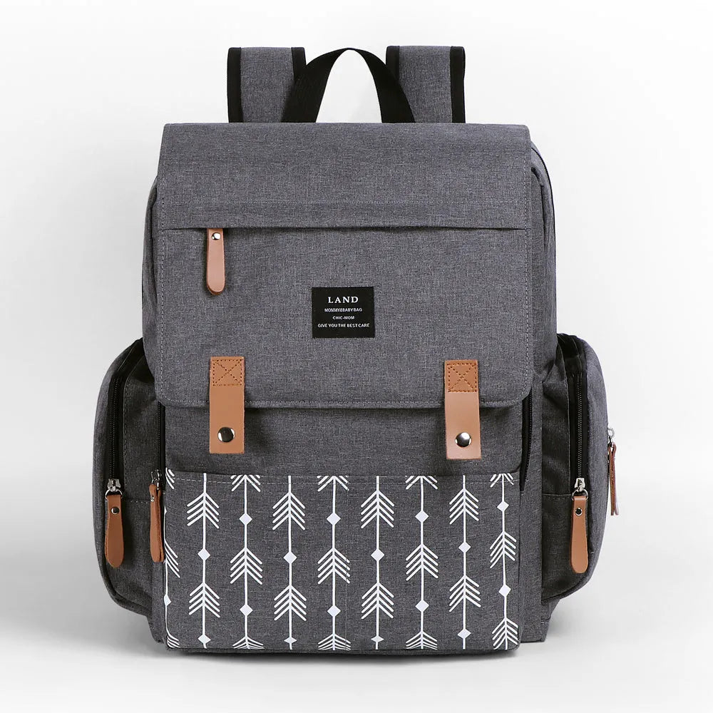 LAND Mommy large grey Oxford cloth diaper backpack with changing mat, showing front compartments.