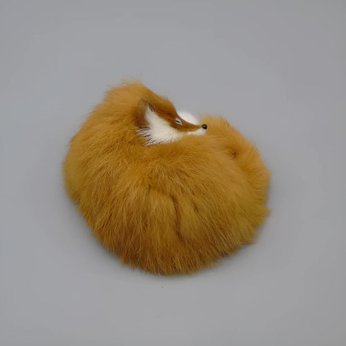 Artificial fox fur car decoration handicraft in red, white, or yellow colours measuring 15cm tall