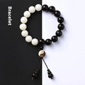 White and blackwood bead bracelet in eight-diagram pattern with natural bodhi seeds