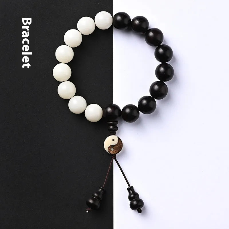 White and blackwood bead bracelet in eight-diagram pattern with natural bodhi seeds