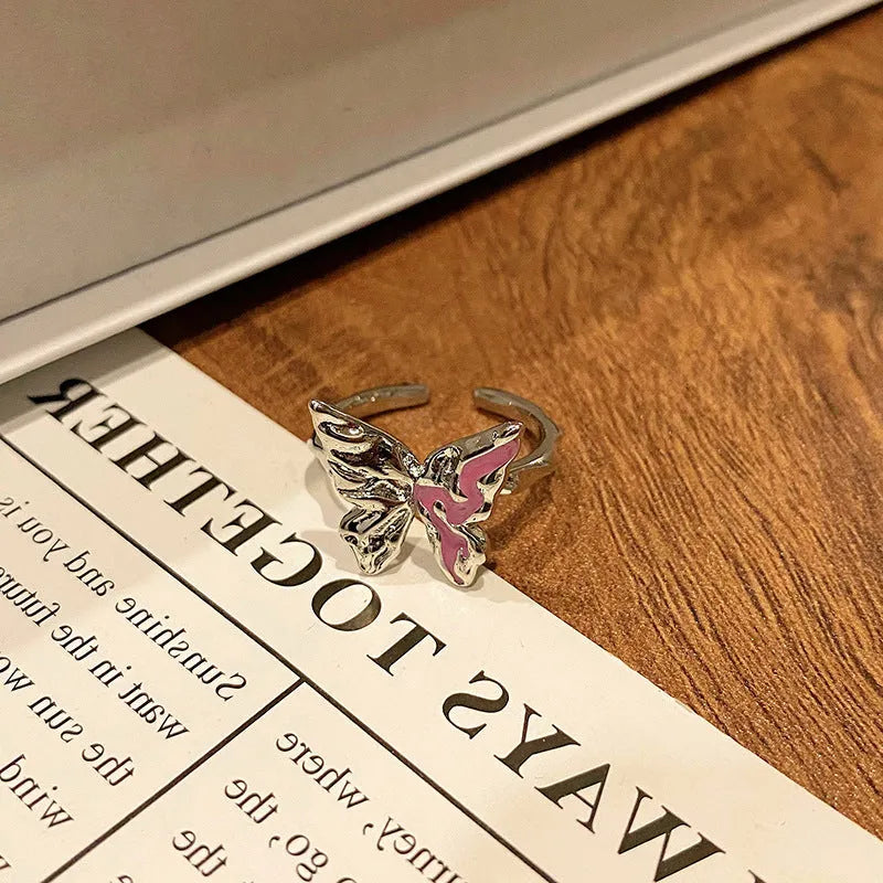 Creative Chinese butterfly women's copper ring with dripping oil treatment process in simple style.