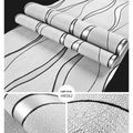 Curve Stripe 3D textured wallpaper roll in dark brown showing raised velvet finish pattern