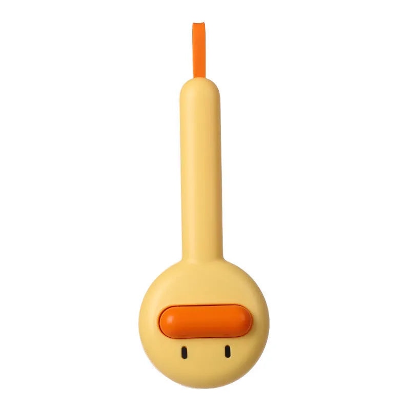 Small yellow duck-shaped pet grooming comb with open section and needle teeth