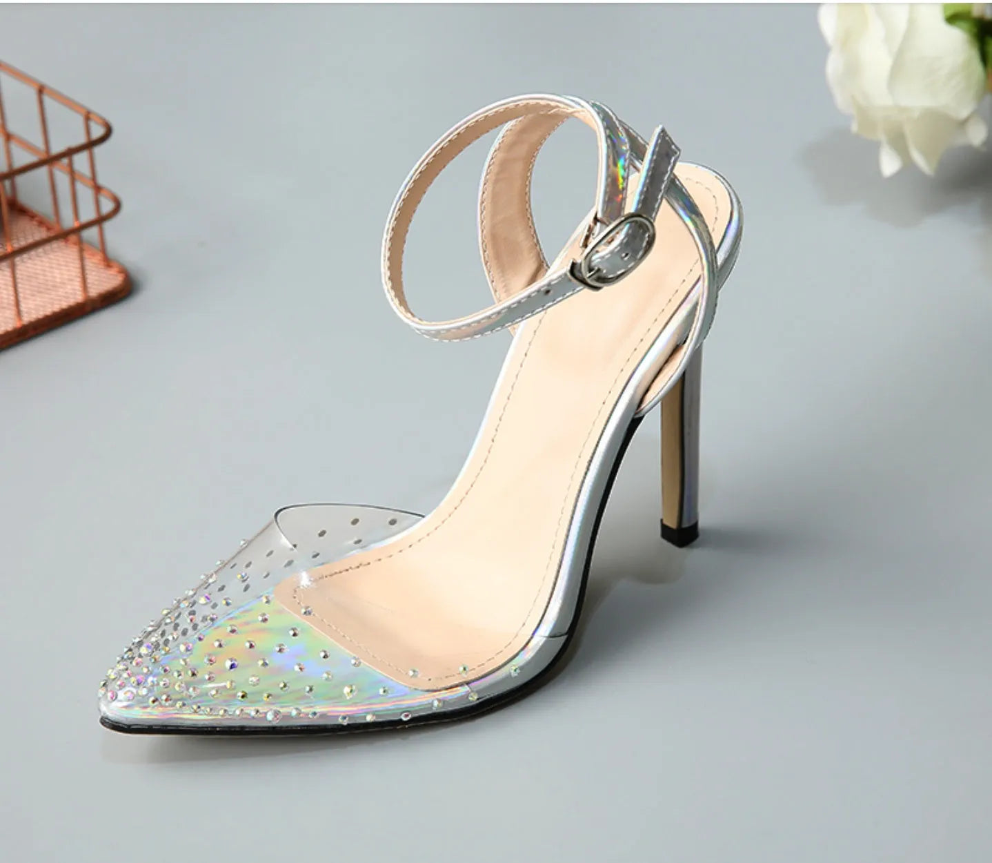 Women's pointed diamond sandals with stiletto heels and strappy PVC construction