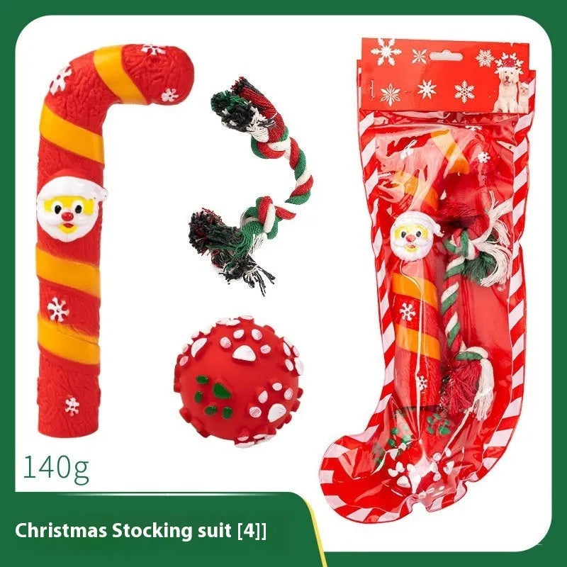 Set of colourful Christmas-themed vinyl dog chew toys including balls, ropes, and Santa figures.
