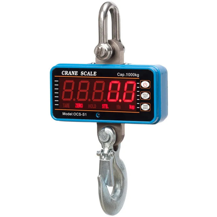 Orange electronic crane scale with direct digital display rated for 500kg load in warehouse